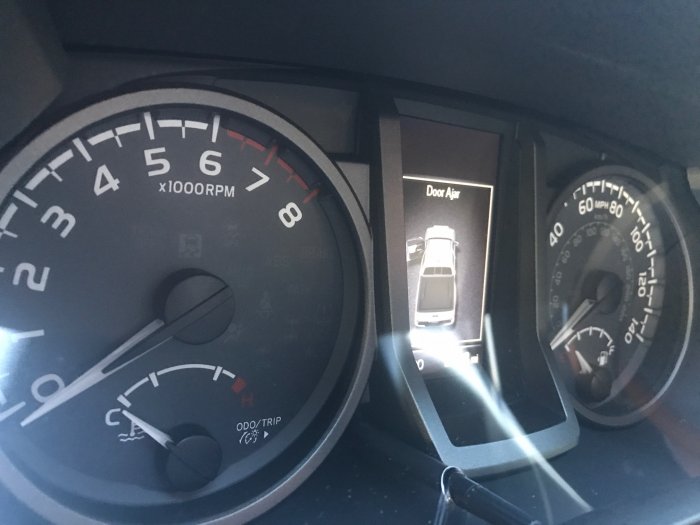 Clear plastic over gauge cluster scratches. Looks like crap after first