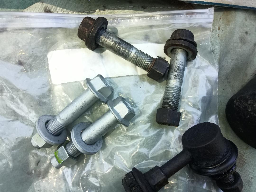 front shock bolts old vs new.jpg