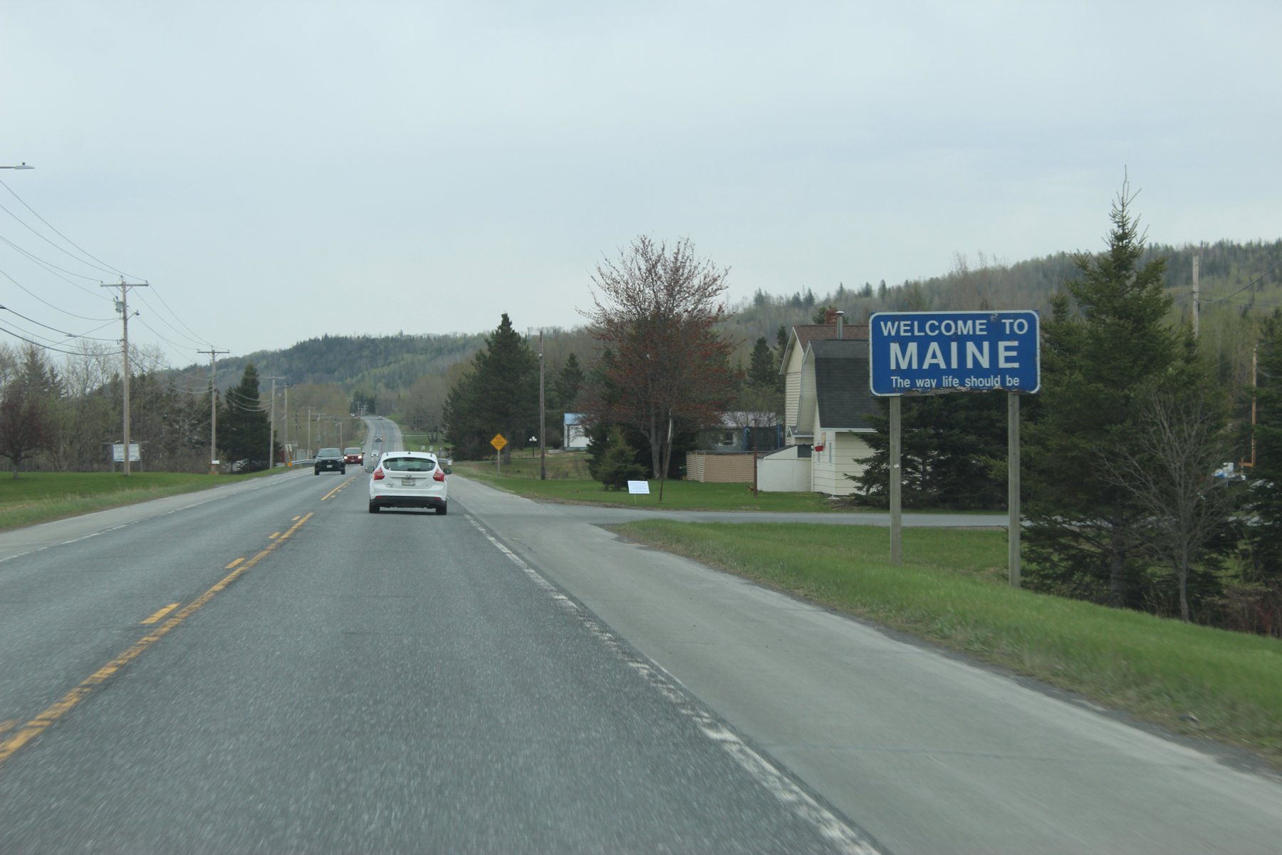 Maine welcome sign US-1  by Canada weathered.JPG