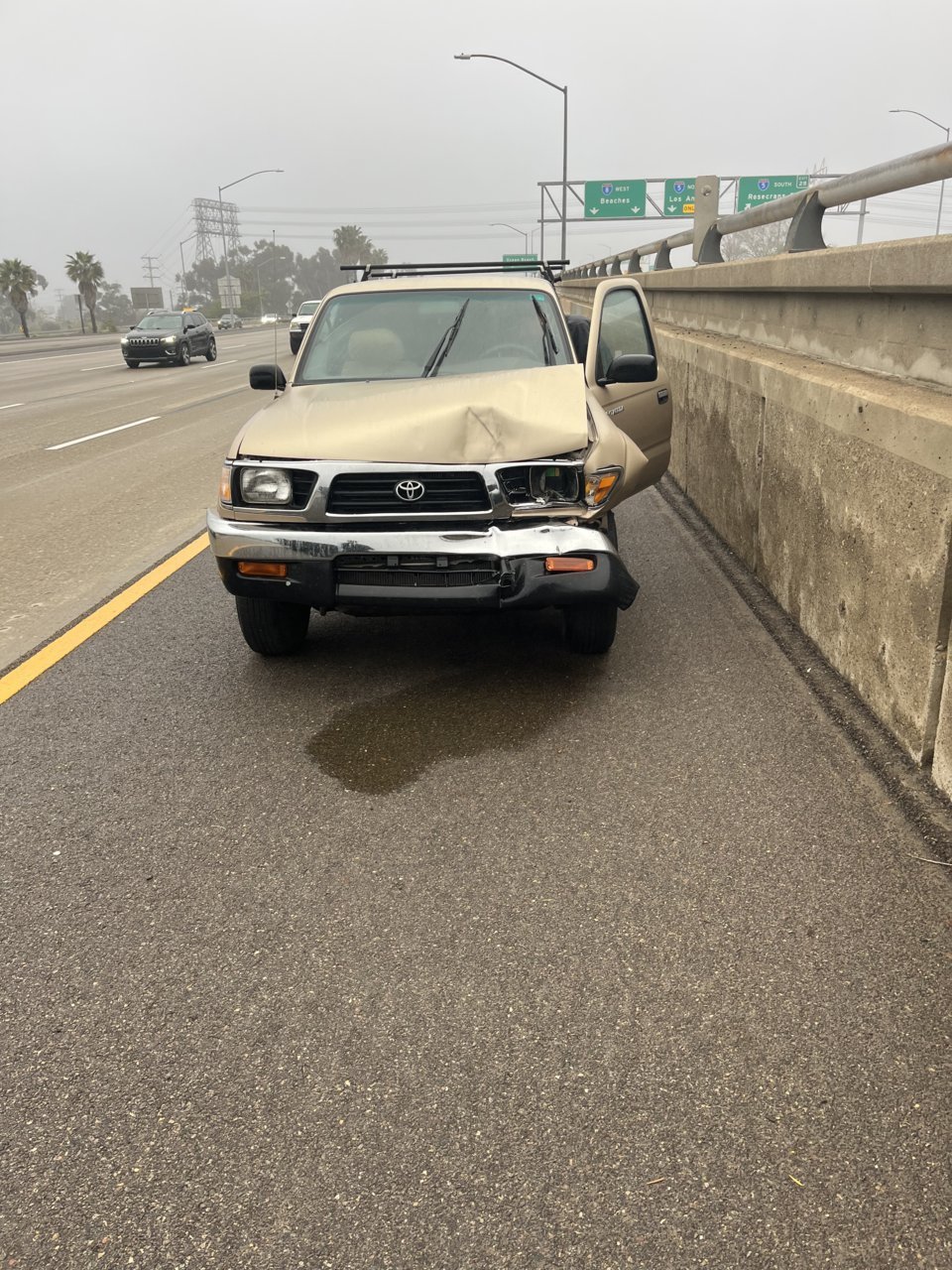 97 4cyl front damage in CA.jpg