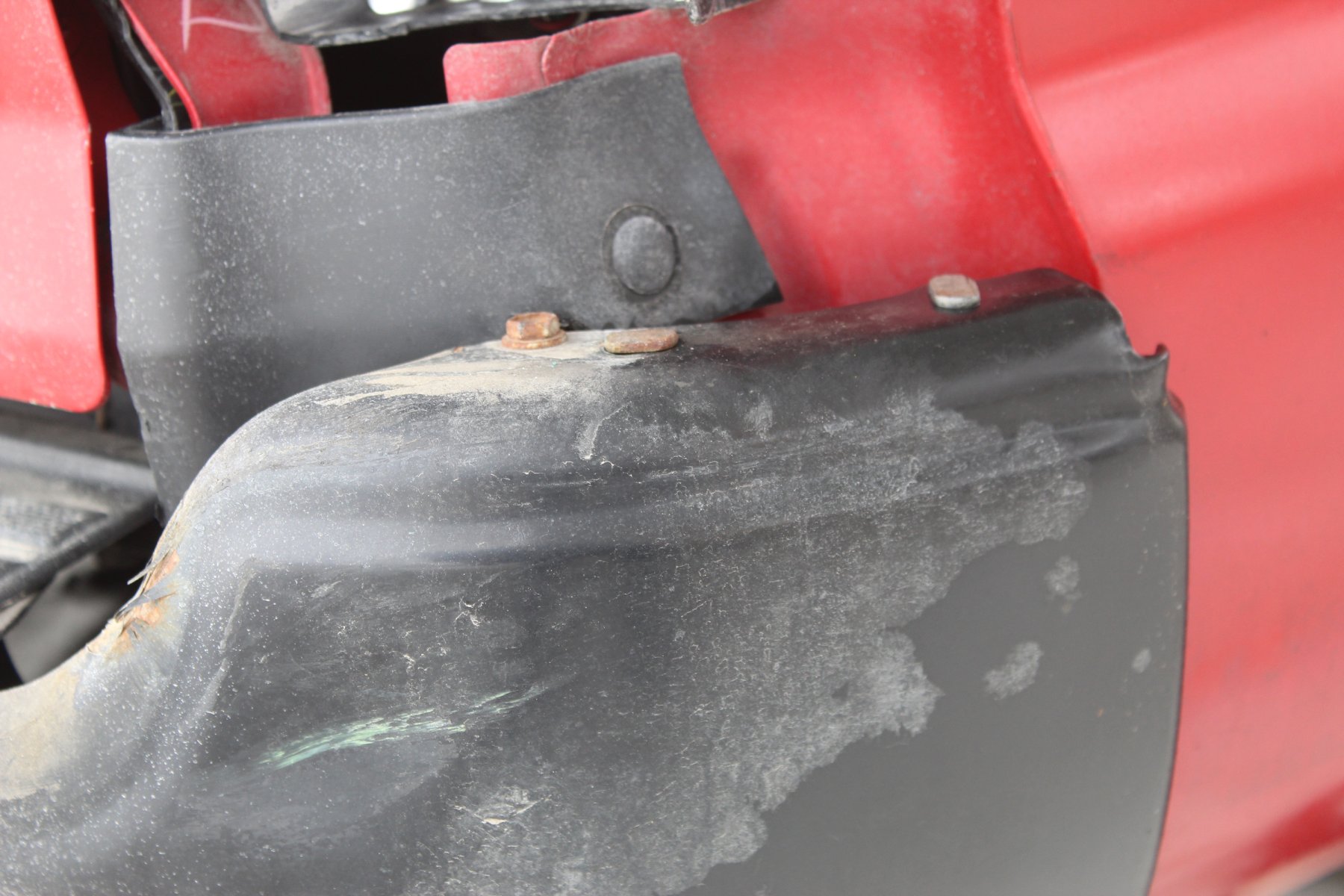 dented  bumper with green servPro paint.JPG